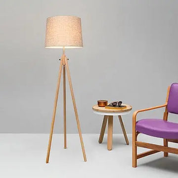 Floor lamp made of metal & wood frame with fabric shade in tripod design – Calvin | Maytoni
