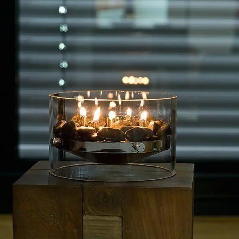 Tischkamin mit mundgeblasenem Glasring, Kieselsteinen & Lampenölbetrieb – Fire | Philippi