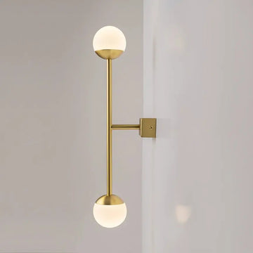 Wall light made of brass-coloured metal with two white glass spheres and touch dimmer – TOUCH | Maytoni