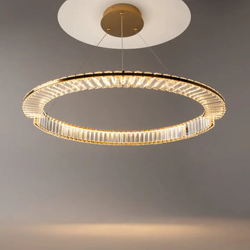 Pendant lamp with brass finish and asymmetrical crystal decoration in a luxurious design – Krone | Maytoni