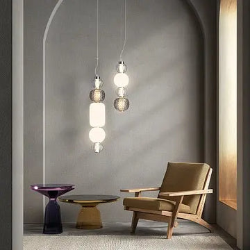 Pendant lamp with chrome metal base, transparent glass and geometric pattern in a modern design – Collar | Maytoni