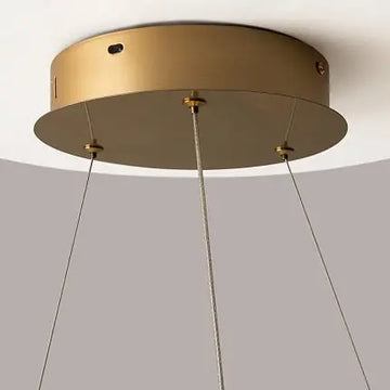 Pendant lamp with brass finish and asymmetrical crystal decoration in a luxurious design – Krone | Maytoni