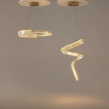 Pendant lamp with brass finish and asymmetrical crystal decoration in a luxurious design – Krone | Maytoni