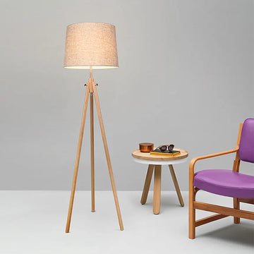 Floor lamp made of metal & wood frame with fabric shade in tripod design – Calvin | Maytoni